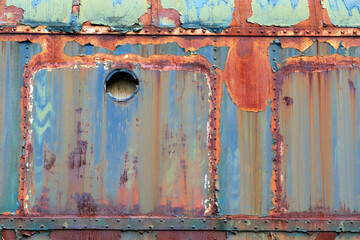 surface texture of rust and peelling paint on metal