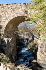 Matafrailes medival bridge over the Lozoya river in the Sierra de Guadarrama, Madrid