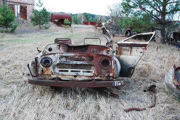 Urbex, vehicle cemetery in Prypiat, metal car front view, Chernobyl Nuclear Power Plant (ChNPP),...