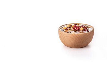 Traditional Turkish Noah's pudding in bowl isolated on white background