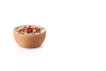 Traditional Turkish Noah's pudding in bowl isolated on white background