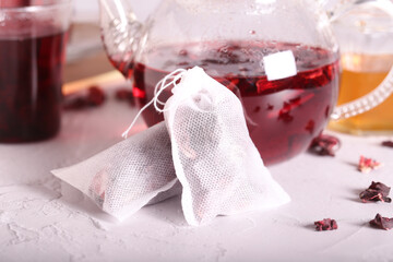 hibiscus dry tea bags are on the table