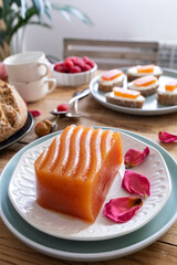 Homemade quince paste. Quince with cheese. Sweet snack at sunset