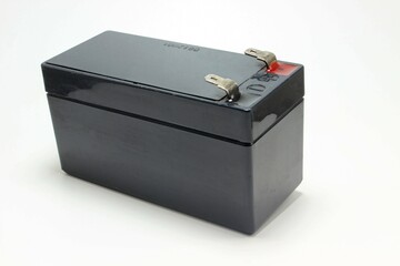12 volt battery in black for uninterruptible power supply 