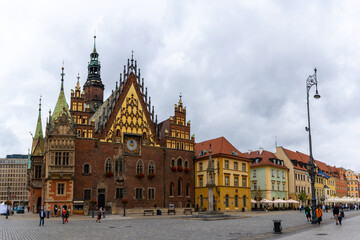Obraz premium historic old town city center of Breslau with ist colorful buildings on the main town square near the city hall