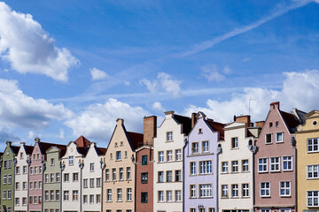 colorful house fronts of row houses on the riverfront of the Motlawa River in the Old Town of Gdansk