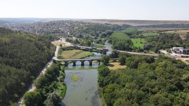 Aerial view of Nineteenth-century bridge over the Yantra River, known as the Kolyu Ficheto Bridge in Byala, Ruse region, Bulgaria