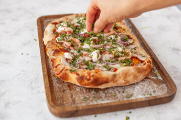 Top view of making a Seafood Roman pizza Tom Yam stile with ingredients