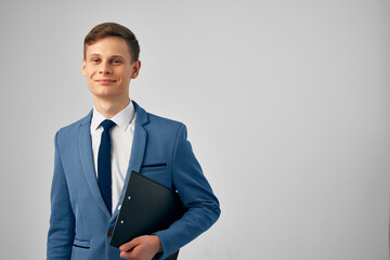 man in a suit with documents manager businessman office