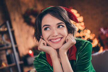 Photo of dreamy thoughtful cute pretty lady hands cheeks look up wear elf costume in decorated home...