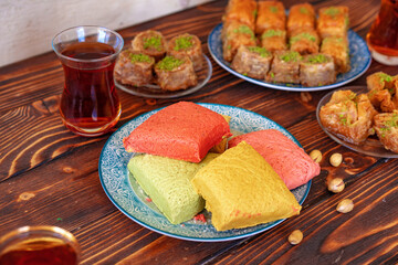 Turkish sweet baklava with Turkish tea on wooden background