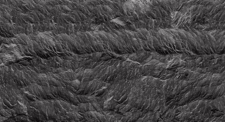 Abstract dark grey black slate background or texture.