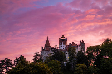 Fototapeta na wymiar Bran Castle at sunset. The famous Dracula's castle in Transylvania, Romania