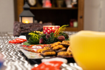 Beautiful table setting with Christmas decorations in living room.