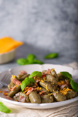 Spinach gnocchi with ham