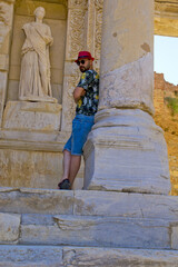  handsome man in sunglasses in ephesus ancient city, izmir