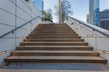 Straight on view of an urban stairwell in downtown Chicago on a sunny day