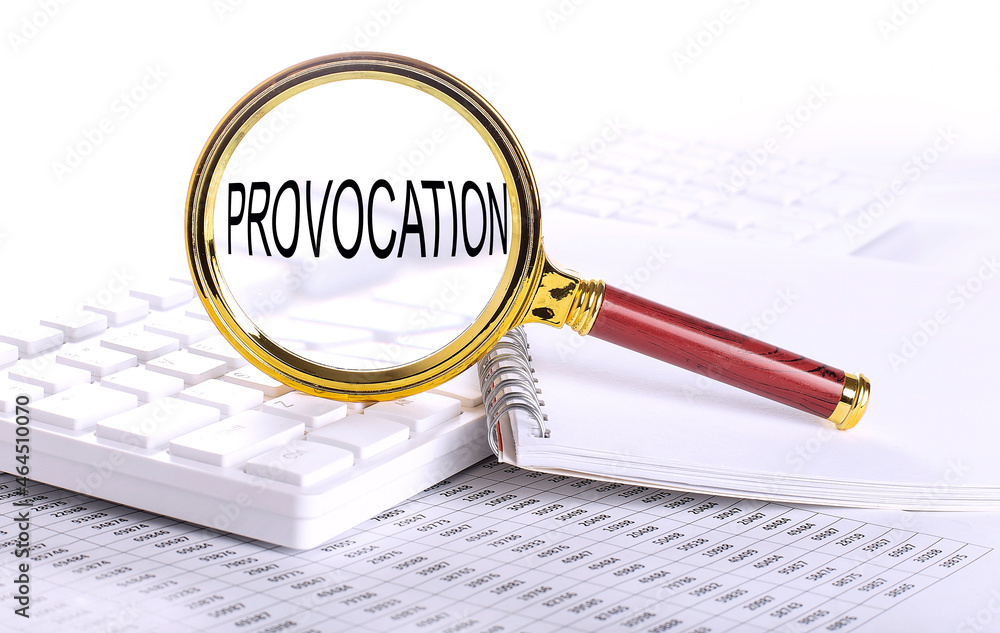 Poster provocation word through magnifying glass on keyboard on the chart