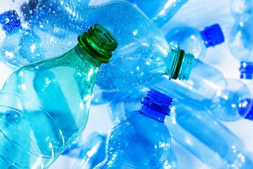 Heap of plastic bottles background top view. Plastic pollution concept.