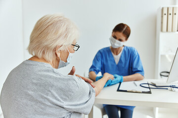 Fototapeta premium nurse and patient professional examination medical office