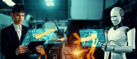 Mechanized industry robot and human worker working together in future factory . Concept of...