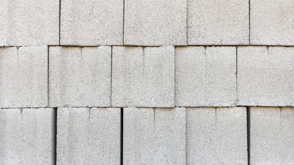 Hollow cinder block. Stone textured background, close up. Banner