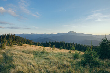 Fototapeta na wymiar wide panorama of mountain peaks. hiking in the mountains. outdoor recreation