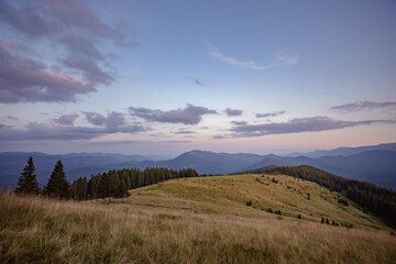 concept of evening sky in the mountains. the beauty of hiking in the mountains. landscape on top of the mountain