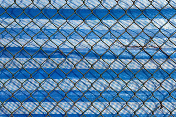fence against blue sky