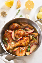 Chicken drumsticks baked with apples