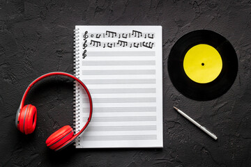 Music sheets with musical notes melody and vinyl record
