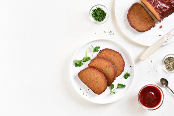 Sliced meatloaf on plate