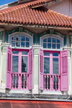 The colorful windows of the Islam style house in Arab street of Singapore. Visitors who enjoy a little bargaining will find it here among the historic shops selling textiles, perfume and more.