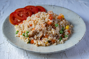 Fried rice with mixed vegetables and pork, top view