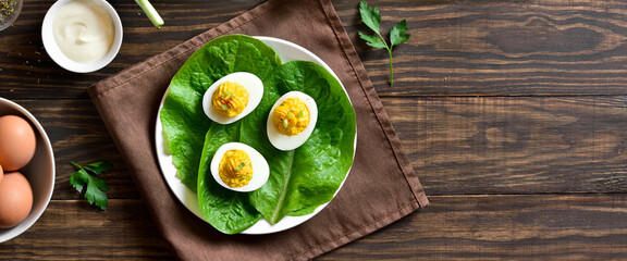 Fototapeta na wymiar Deviled eggs with paprika, mustard and mayonnaise