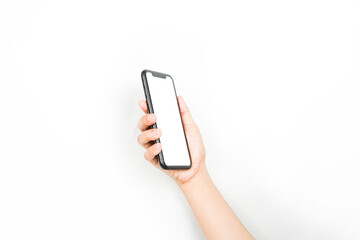 a hand holding a cellphone with an empty screen in a position like it wants to see something. a smartphone with a blank white screen used for advertising mockup.