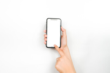holding a cellphone with an empty screen like it wants to show something. a smartphone with a blank...