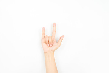 a hand gesture that is usually used to symbolize rock genre or metal. collection of the sign language using hand gestures.