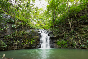 Naklejka na ściany i meble Ton Rak Sai Waterfall is in Namtok Sam Lan National Park. 