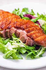roasted duck breast with green salad