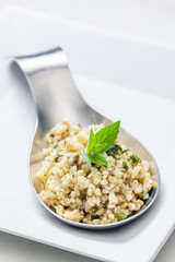 still life of bulgur salad with mint
