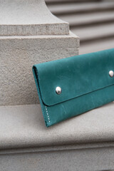hand made leather wallet . Leather craft. Selective focus