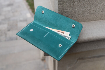 hand made leather wallet . Leather craft. Selective focus