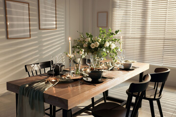 Festive table setting with beautiful tableware and decor indoors