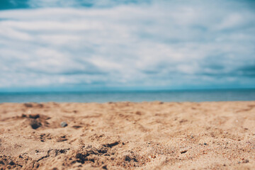 Empty beach sea sand close up. Summer day. Travel background and banner. Ocean tropical beach landscape. Blue sky.