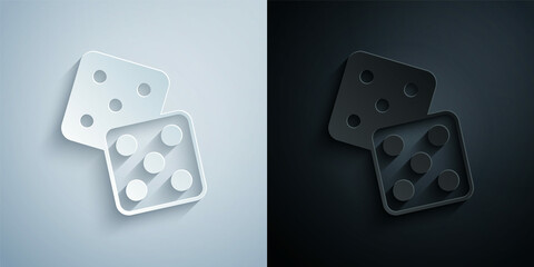 Paper cut Game dice icon isolated on grey and black background. Casino gambling. Paper art style. Vector