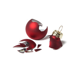 Broken red christmas ball isolated on white background. Choose between glass balls or plastic balls...
