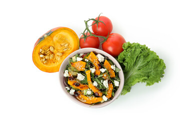 Plate with pumpkin salad and ingredients isolated on white background