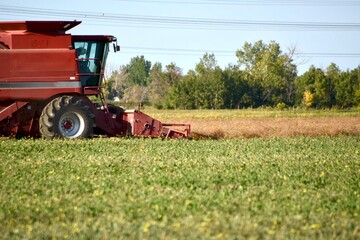 combine harvester working on a field
