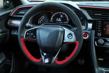 Close-up shot of a no brand steering wheel.